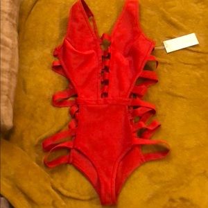 Brand new one piece cut out bathing suit